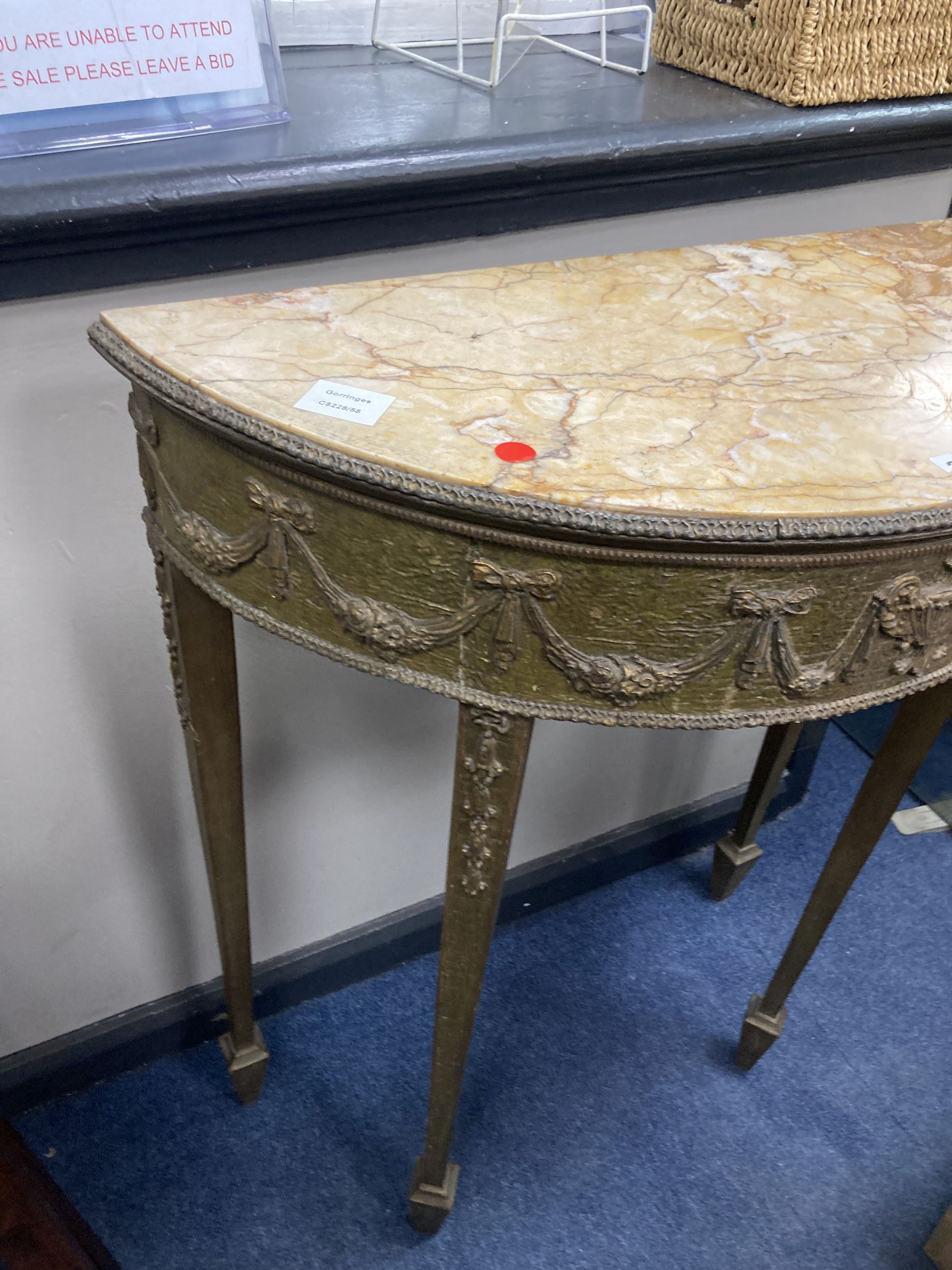 A marble and gilt composition demi lune table, width 70cm, depth 32cm, height 82cm